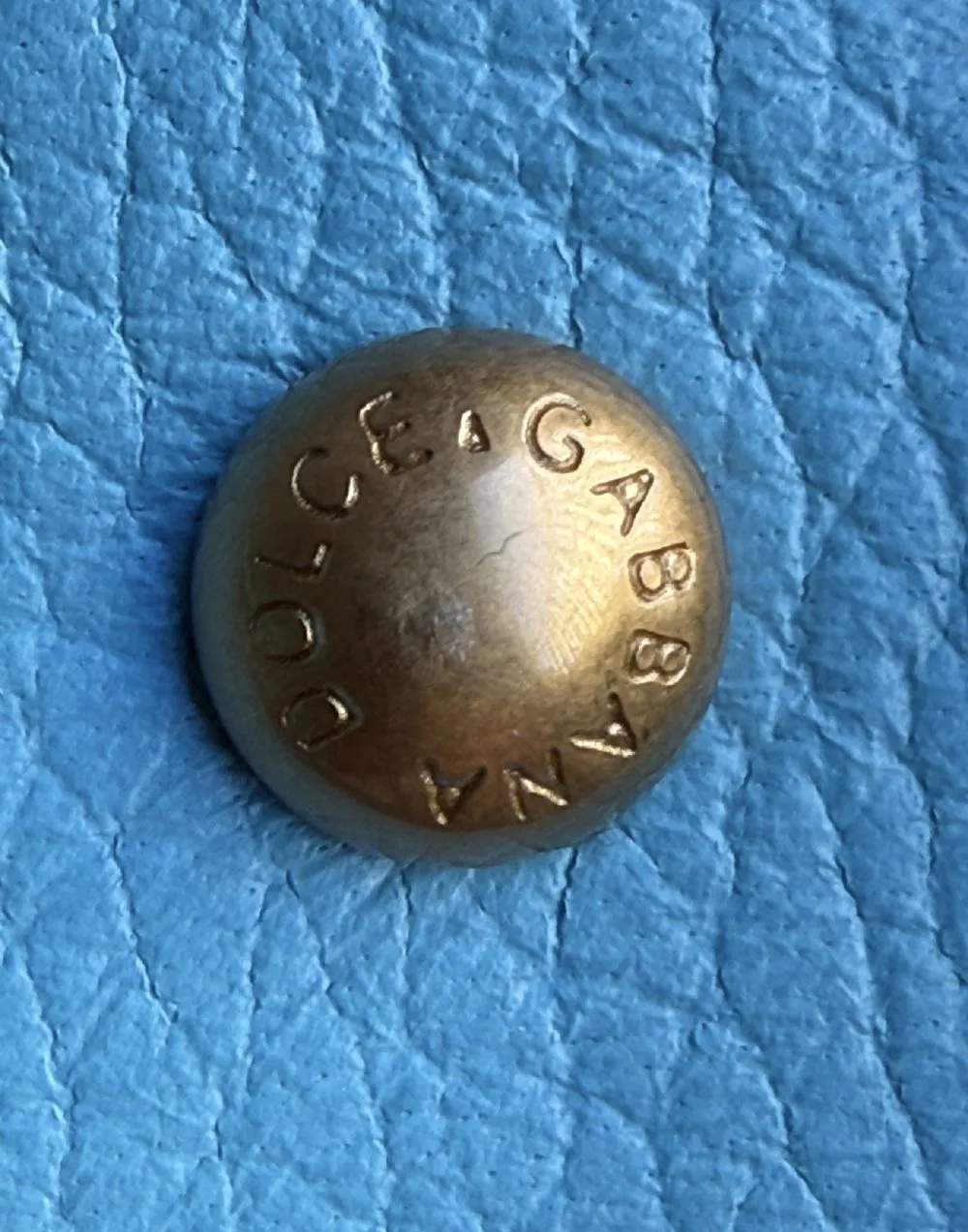Dolce & Gabbana snap button on blue leather
