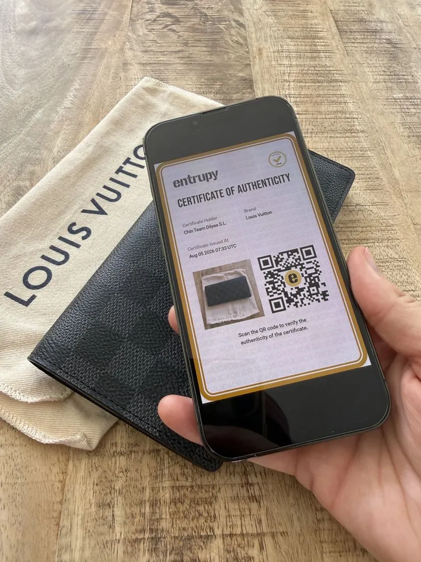 Entrupy certificate of authenticity on a phone screen
